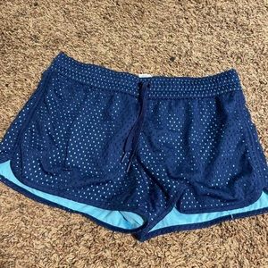 Light and dark blue athletic shorts